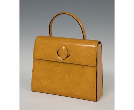 CARTIERHappy Birthday bagPatent leather.Mustard patent leather Happy Birthday bag from Cartier Vintage featuring a round top 