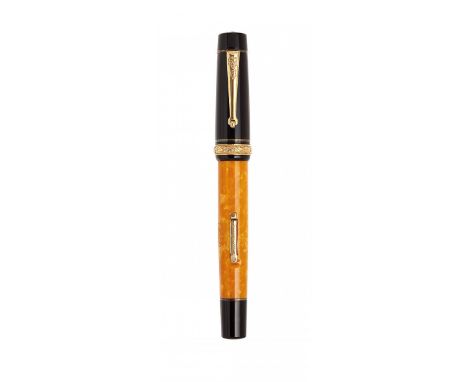 DELTA "DOLCE VITA" FOUNTAIN PEN, 1996.Black and orange resin barrel with gold details.Two-tone 18 Kts gold nib, M-point.Limit