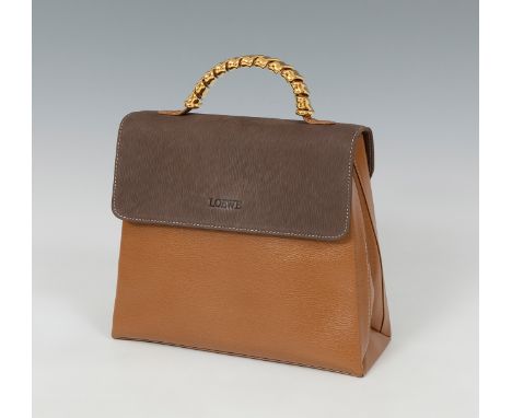 LOEWE.Vintage “Velázquez” bag.Combined leather and golden appliqués.Loewe signature bag, which presents a sober design of str