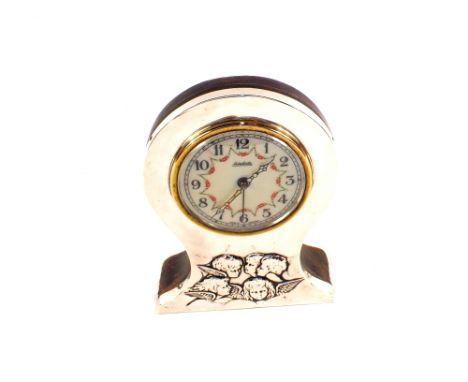 A Silver clock with enamel dial and cherub decoration, Birmingham 1904