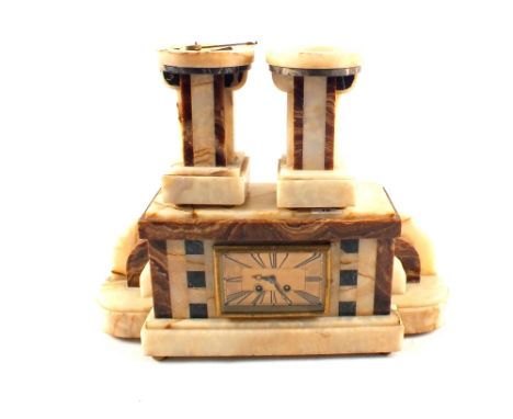 An Art Deco brown and white Onyx striking mantel clock garniture