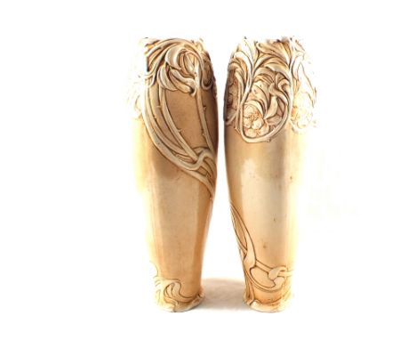 A pair of buff ground Bretby vases with floral Art Nouveau decoration, height 20"