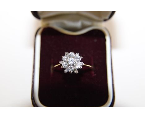 A 18ct gold & multi cluster diamond snow flake design ring.(see valuation) 