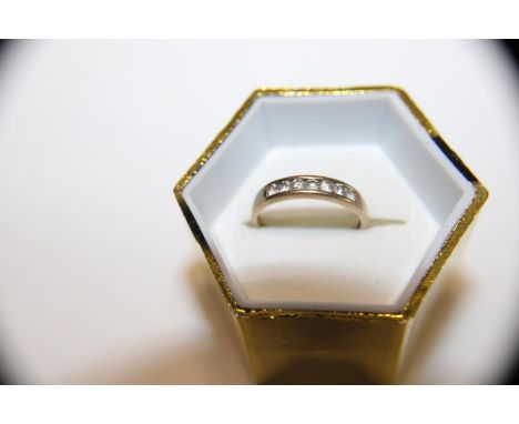 A 9ct gold half eternity ring 