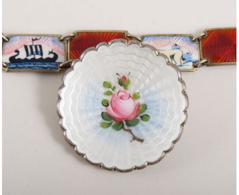 Scandinavian silver jewellery to include a Norwegian sterling circular concave brooch with guilloche and floral enamel decora