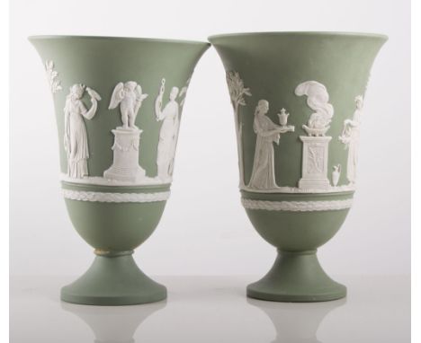 Near pair of Wedgwood green jasperware urn-shaped vases, applied moulded decoration of classical figures, 19 and 18.5cms; a c