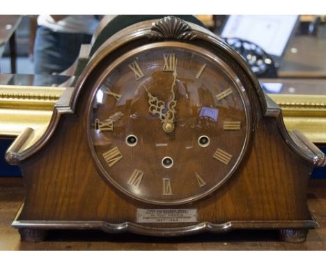 Walnut cased mantel clock, Presentation plaque, Smith's movement striking on gongs, width 36cms.
