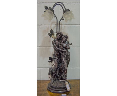 Cast bronzed finish table lamp, The Lovers, with twin glass shades, height 79cms.
