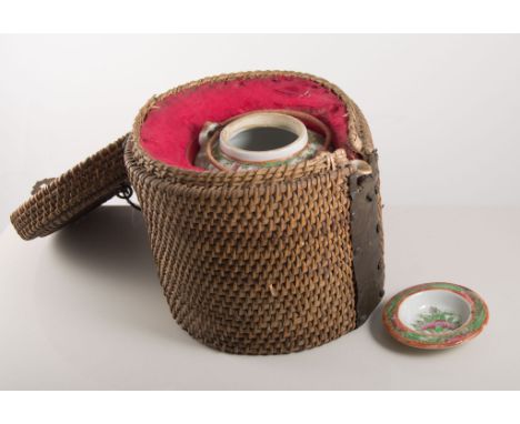 Cantonese cylindrical teapot, decorated with figures, birds and flowers, 15cms in a woven carrying case.