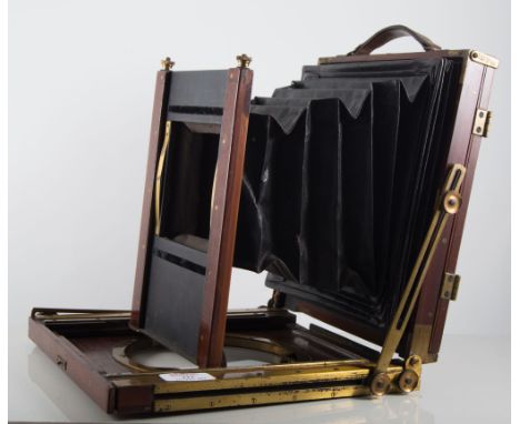 Ross mahogany cased plate camera with plates, three lenses and a tripod.