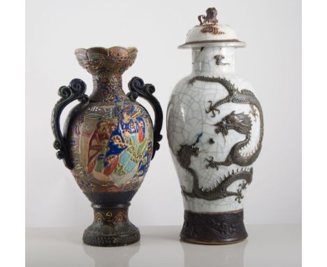 Pair of Japanese Kaga ware two-handled vases, decorated with figures, 31cms and a pair of crackle glazed vases, (4).