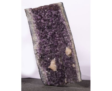 Large concave amethyst multi-crystal specimen, 67cm x 33cm, having other white quartz crystals, all displaying the trigonal s