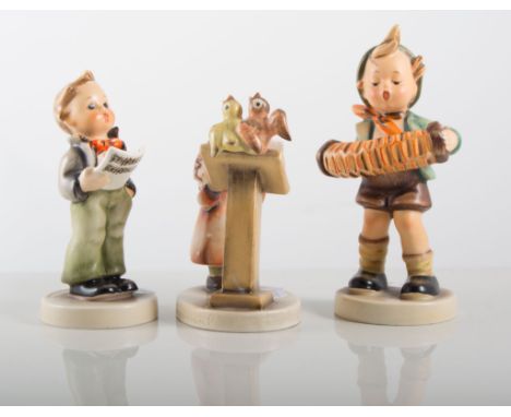 Three Hummel figures of a musical nature.