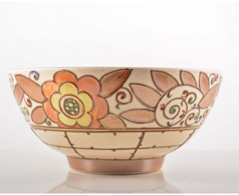 Charlotte Rhead bowl, floral design on a buff ground by Bursley ware, 9cms high, 19cms diameter.