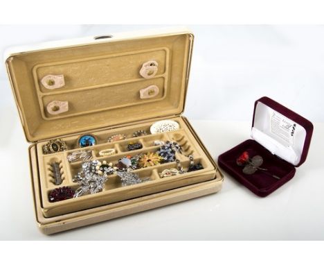 A jewel box with lift out tray containing costume jewellery brooches and pendants, paste, marcasite, butterfly wing, abalone,