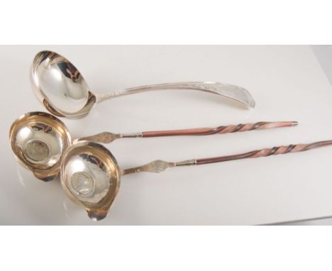 Pair of ladles, 18th Century, twisted whale bone handles, coin set, plus ladle.