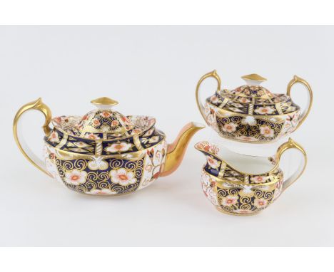 Royal Crown Derby imari tea service, circa 1901/09, pattern 2451, comprising lidded teapot, lidded sucrier and milk jug, prin