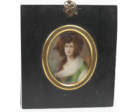 French portrait miniature, circa 1900, featuring a young lady in a green dress with white scarf, oval, 7.5cm x 6cm 