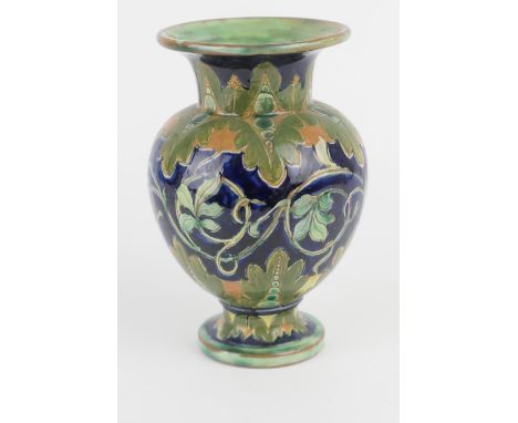 Della Robbia vase, by Liz Wilkins and Arthur Bells, circa 1894-1906, shape no. 367, decorated with green incised leaves flank