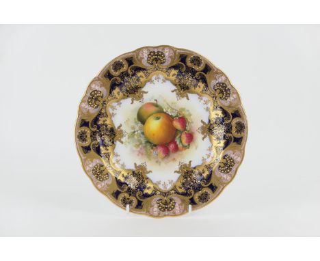 Royal Worcester fruit decorated plate, date code for 1921, the centre decorated with apples and wild strawberries within an u