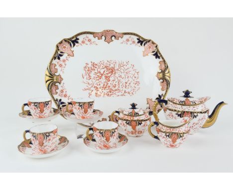 Royal Crown Derby cabaret set, circa 1891-95, decorated in imari colours, pattern 2712, comprising a shaped tray, 45cm x 35cm