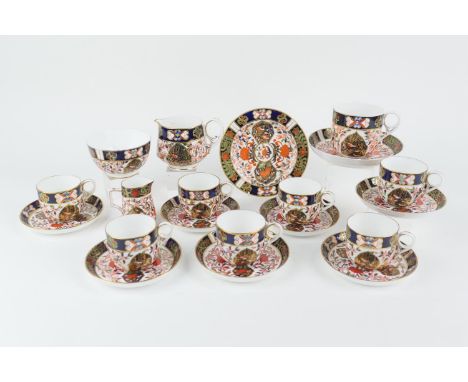 Crown Derby Porcelain imari coffee wares, circa 1878-1900, all pattern 198, comprising seven coffee cups and saucers; oversiz