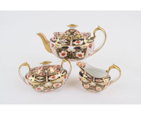 Royal Crown Derby imari tea service, circa 1890-1915, comprising teapot, lidded sucrier and milk jug, the teapot 12.5cm, prin