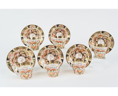 Stevenson &amp; Hancock Derby, six imari coffee cups and saucers, circa 1870-1900, pattern akin to 6299, painted red baton ma