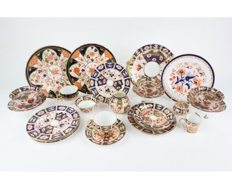 Pair of Royal Crown Derby imari pattern plates, each centred with a leaf, printed marks, 23.5cm diameter; also three Royal Cr