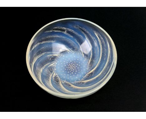Lalique Poisson bowl, moulded with fishes and tinted with blue opalescence, moulded mark 'R Lalique', 21cm diameter 