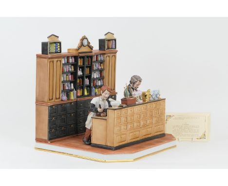 Large Capodimonte porcelain model 'The Old Pharmacist' by R Guidolin, limited edition numbered 213, signed, width 33.5cm, hei