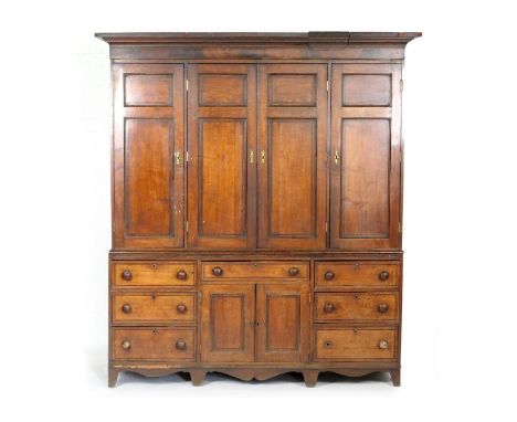Late George III oak housekeeper's dresser, circa 1800-20, having a cavetto cornice over a back with four recessed double pane