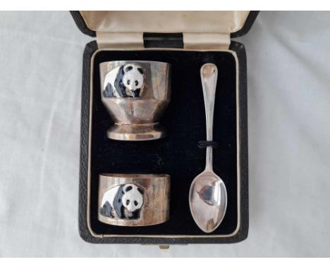 A boxed silver and enamel egg cup and napkin ring - Birmingham 1946 by S. Mordan