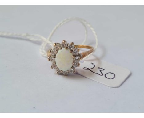 An opal and CZ 9ct dress ring size J