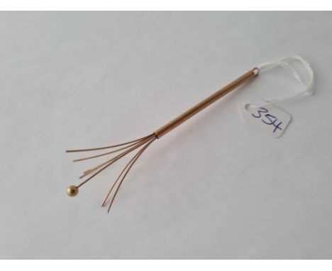 A 9ct pendant swizzle stick 5.8 g.