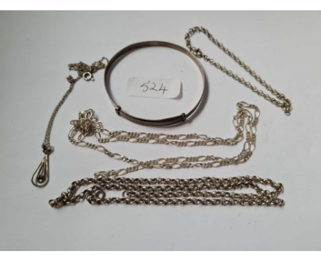 A silver bangle and silver chains 27g