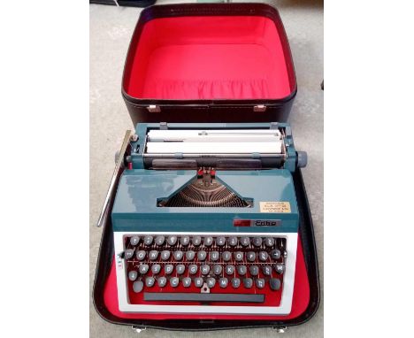 An Erika Manual typewriter &amp; case