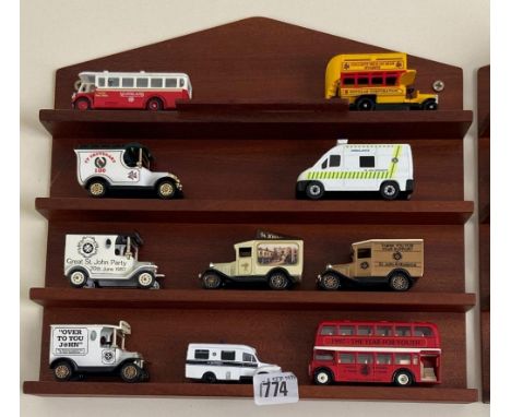 Group of ten miniature vans/buses etc on bracket