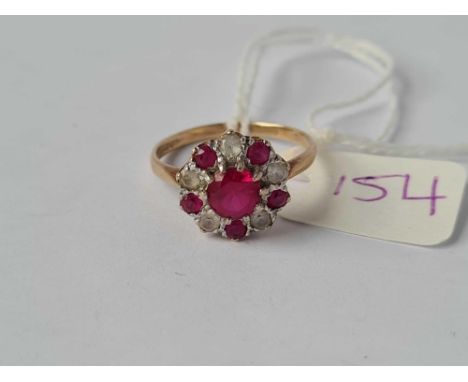 A ruby and white stone cluster ring 9ct size O - 2.6 gms
