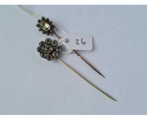 A Georgian silver and paste stick pin and Victorian gold and silver set paste stick pin 