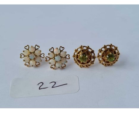 A pair of peridot set earrings and opal cluster earrings both 9ct 