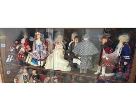 A shelf of aproximately 15 costume dolls, many by Peggy Nesbitt incl; Sherlock Holmes, Henry VIII
