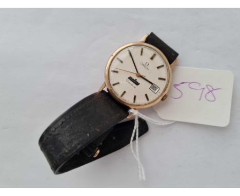 A gents OMEGA Geneve wrist watch with seconds sweep and date aperture and leather strap WO
