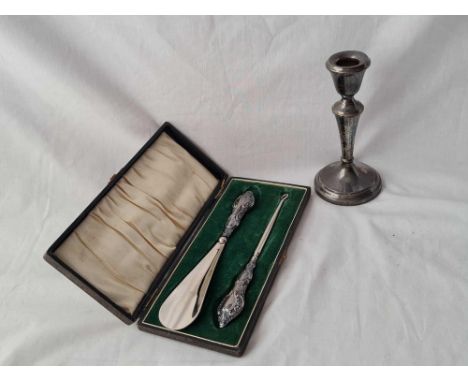 A boxed button hook and a shoe horn - Chester 1914 and 6" candlestick