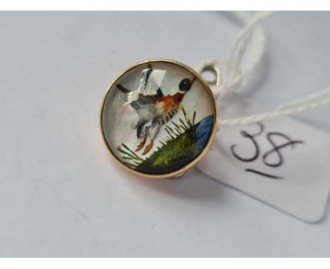 A gold Essex crystal button depicting a Mallard in flight