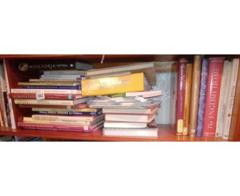 Middle shelf of needlework &amp; other books