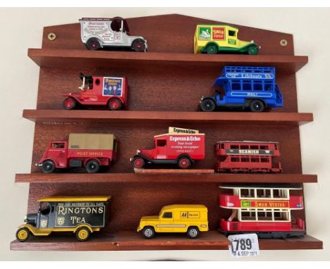 A  bracket with ten advertising vans &amp; trams 