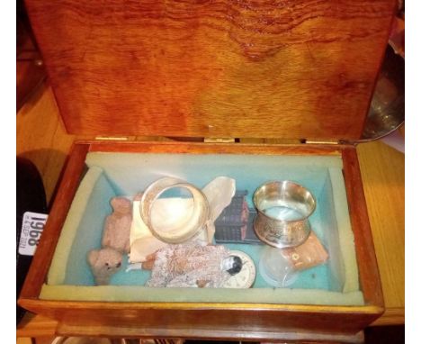 An oak box with miniature doll compass etc