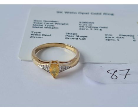 A yellow pear shaped opal set in 9ct mount comes with certificate 