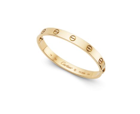  Cartier: A 'Love' Bracelet  The polished bangle, decorated throughout with screwhead motifs, signed Cartier, numbered, Carti